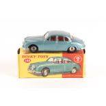 A Dinky Toys Daimler 2.5 litre V8 (146). An example in pale metallic green with red interior and