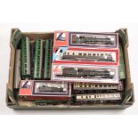 A quantity of OO gauge model railway by Lima and Tri-ang. 4 locomotives - 2x GWR Class 8P 4-6-0