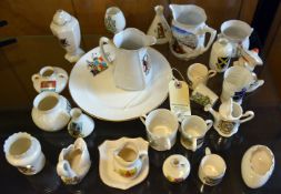 26 pieces of crested china, including Union jug, arms of Gloucester, Grafton China urn, Warwick,