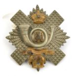 A Vic NCO’s bi-metal glengarry badge of a Vol Bn The Highland Light Infantry, blank scrolls. GC (