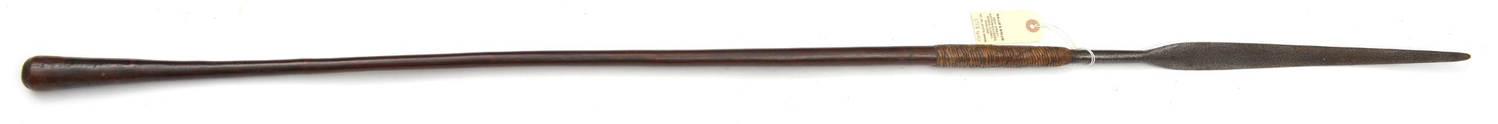 A Zulu throwing spear, 54” slender leaf shaped ;blade 14”, rattan binding, swollen wood finial. GC