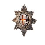 An officer’s silver SD cap badge of the Coldstream Guards, blue and red enamelled centre, HM F&S B’