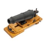 A good model of a Royal Navy carronade c. 1800, iron barrel 11”, mounted on sliding timber