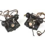 A black bakelite telephone c 1940, with Eastbourne number, GC; another similar badly damaged; also a