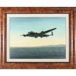 An oil painting on canvas of an RAF Lancaster Bomber. Depicting a lone bomber loaded with a bouncing