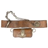 An officer’s brown leather shoulder belt and pouch of the Cambridge University Rifles, WM flap badge