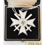 A Third Reich War Merit Cross 1st class with swords, in its case. New Condition