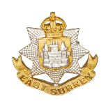 A KC officer’s gilt and silver plated cap badge of The East Surrey Regt. VGC Plate 1