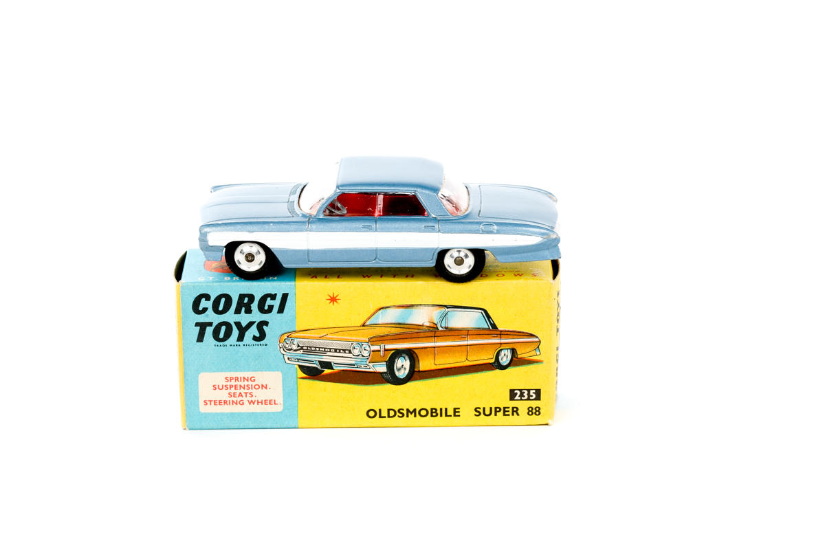 A Corgi Toys Oldsmobile Super 88 (235). An example in light metallic blue with white stripe and