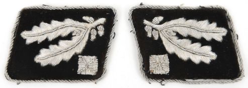 A pair of bullion embroidered collar patches to an SS Brigadefuhrer. GC