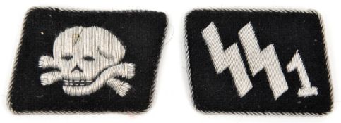 A pair of bullion embroidered SS collar patches: “SS1” with remains of RZM label, and death’s