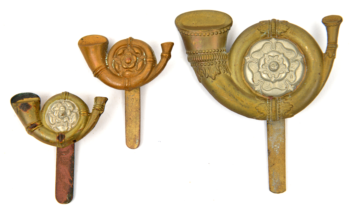 3 KOYLI cap badges: large (669) and small bi-metal, and all brass. GC