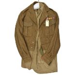 A WWII British officer’s khaki BD jacket, open lapels and WWII ribbons; a pair KD trousers; an OR’