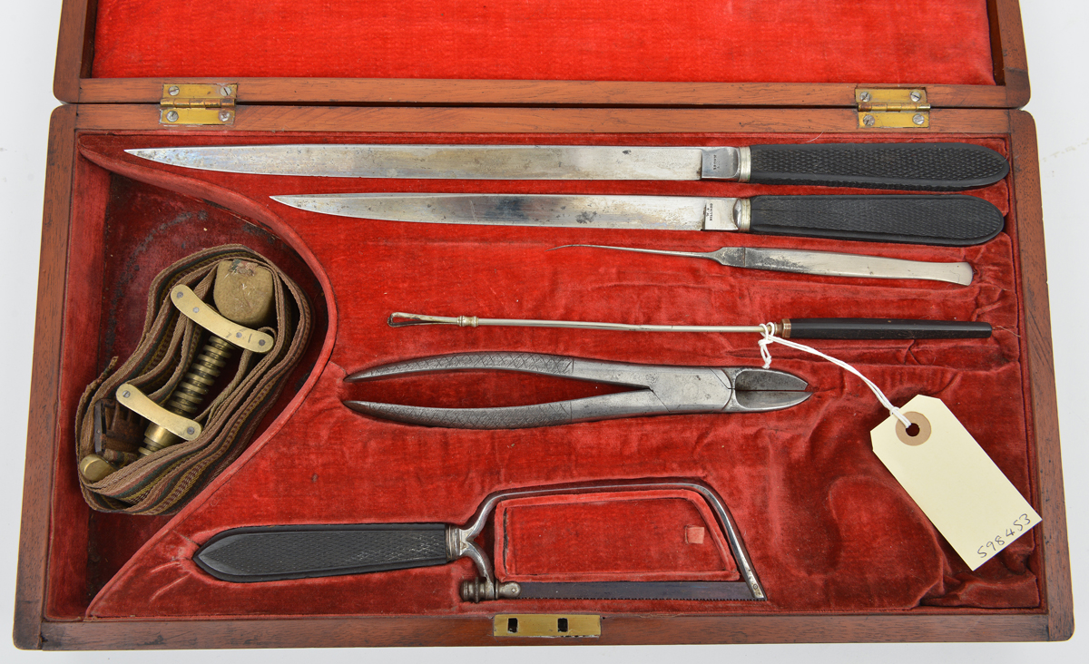A 19th cent surgeon’s kit, comprising 2 long knives, stitching spike, slender tweezers, cutter,