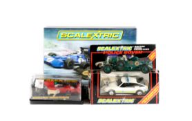 5 Scalextric Cars. A Legends 2-car set (C3479A). Comprising a Tyrrell 003 and a Team Lotus Type 72E.