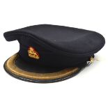A scarce officers peaked blue SD cap of The Rhodesia Regiment, KC gilt badge and side buttons.