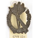 A Third Reich Infantry Assault badge in bronze, with maker’s mark “W H” (W Hobacher, Vienna).