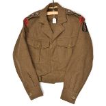 A Captain’s khaki BD blouse of The R Engineers, with 7th Armoured Division “Desert Rats” cloth