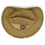 A WWII slouch hat, with khaki puggaree bearing 14th Army and 2nd Division patches, sweatband