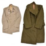 A WWII officer’s “Coat British Warm” dated 1944, a pair of WWII KD trousers of ORs type; a Royal
