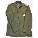 A Third Reich officer’s green service dress jacket, SS collar patches to Obersturmfuhrer, plain