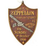 A portion of WWI Zeppelin which was shot down at Potters Bar on 1st October 1916, mounted on a