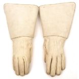 A pair of white cavalry gauntlets, GC