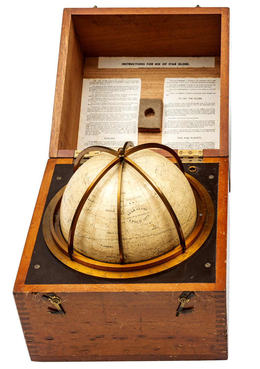 A cased seven inch “Star Globe Epoch 1975”, manufactured by Kelvin & Hughes, contained in its wooden