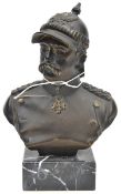 A bronzed spelter head and shoulders bust of Hindenburg, wearing uniform and cuirassier helmet