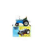 A Corgi Toys Ford 5000 Super Major Tractor (67). An example with blue body, grey mud guards, grey