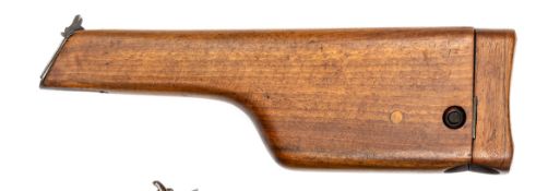 A walnut holster/shoulder stock for the 1896 “broom handle” Mauser automatic pistol, numbered “537”.
