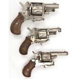 A 6 shot .22” rimfire blank cartridge revolver, with folding trigger and plain wood grips; another