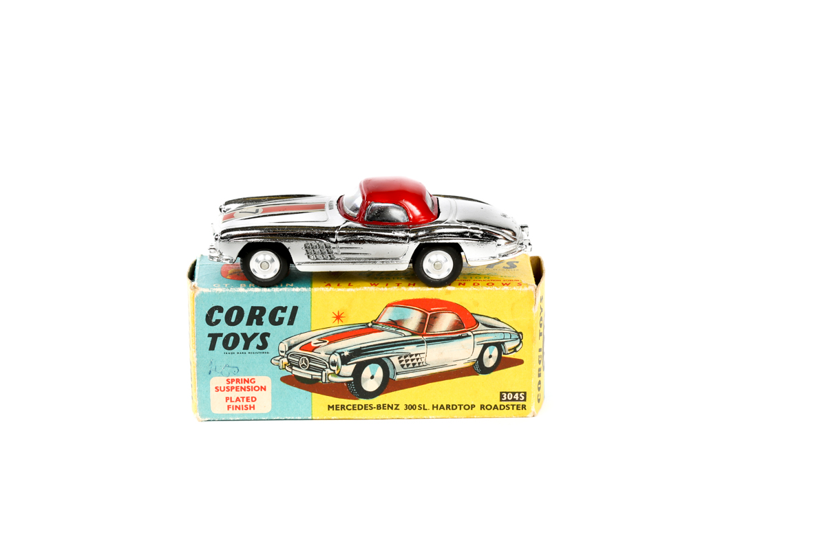 A Corgi Toys Mercedes-Benz 300SL Hardtop Roadster (304S). A silver vacuum plated example with red