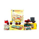 4 Dinky Toys. A Leyland 8-wheeled Chassis (936) with 3 loads. An Austin Mini-Moke (342). A