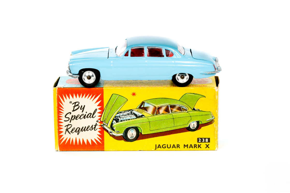 Corgi Toys Jaguar Mark X (238). Example in light blue with red interior. Complete with case in boot.