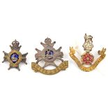 2 officers cap badges: Notts & Derby, and one collar, with blue enamel centres, GC, and Loyal Regt