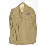A WWII KD officer’s jacket, with WWI etc ribbons including VC and MC; another similar, all buttons