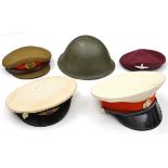 A 1972 dated steel helmet (turtle type); a staff officer’s SD cap; a post 1953 ORs Parachute Regt
