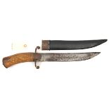 An Indian bowie type knife, shallow fullered blade 11”, steel crossguard with langets and down