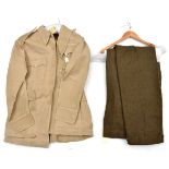 A WWII British KD jacket, another similar, a pair of KD trousers and a pair of KD shorts.