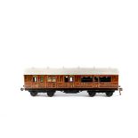 A Gauge One Railway 1920s Bing for Bassett-Lowke tinplate LNER brake 3rd bogie coach. An example