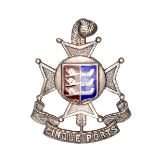 An officer’s silver plated cap badge of the 5th (Cinque Ports) Bn R Sussex Regt, blue and red