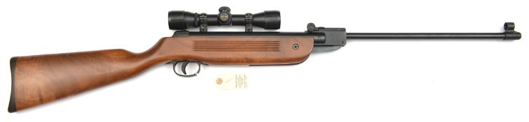 A .177” Edgar Brothers Mod 35 break action air rifle, number 0303 06150, with walnut stock and