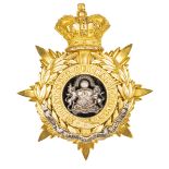†A Vic officer’s gilt and silver plated HP of The Manchester Regt, arms and motto to centre. VGC see