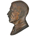 A large bronzed cast iron Hitler head hanging wall plaque, 14”, signed “K Siegert, Munchen”, the