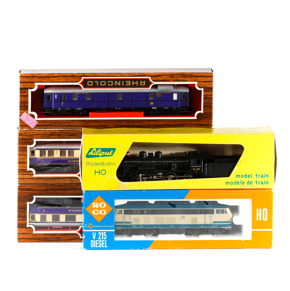 A quantity of 'HO' gauge railway. A RoCo DB class 215 Bo-Bo diesel locomotive, RN 215 033-2. In