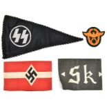 Third Reich items: Hitler Youth printed armband, and white on grey “Sk” armband; an SS woven