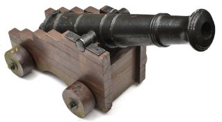 A cannon in the style of the 19th century, iron barrel (not bored through) 36”, stepped wooden