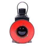 A British Railways Southern Region Buffer Stop Lamp. A single aspect lamp with red warning ring