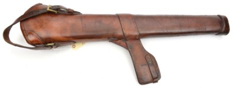 A WWI period brown leather bucket for Enfield carbine, with straps and buckles, stamped “D M & Co”